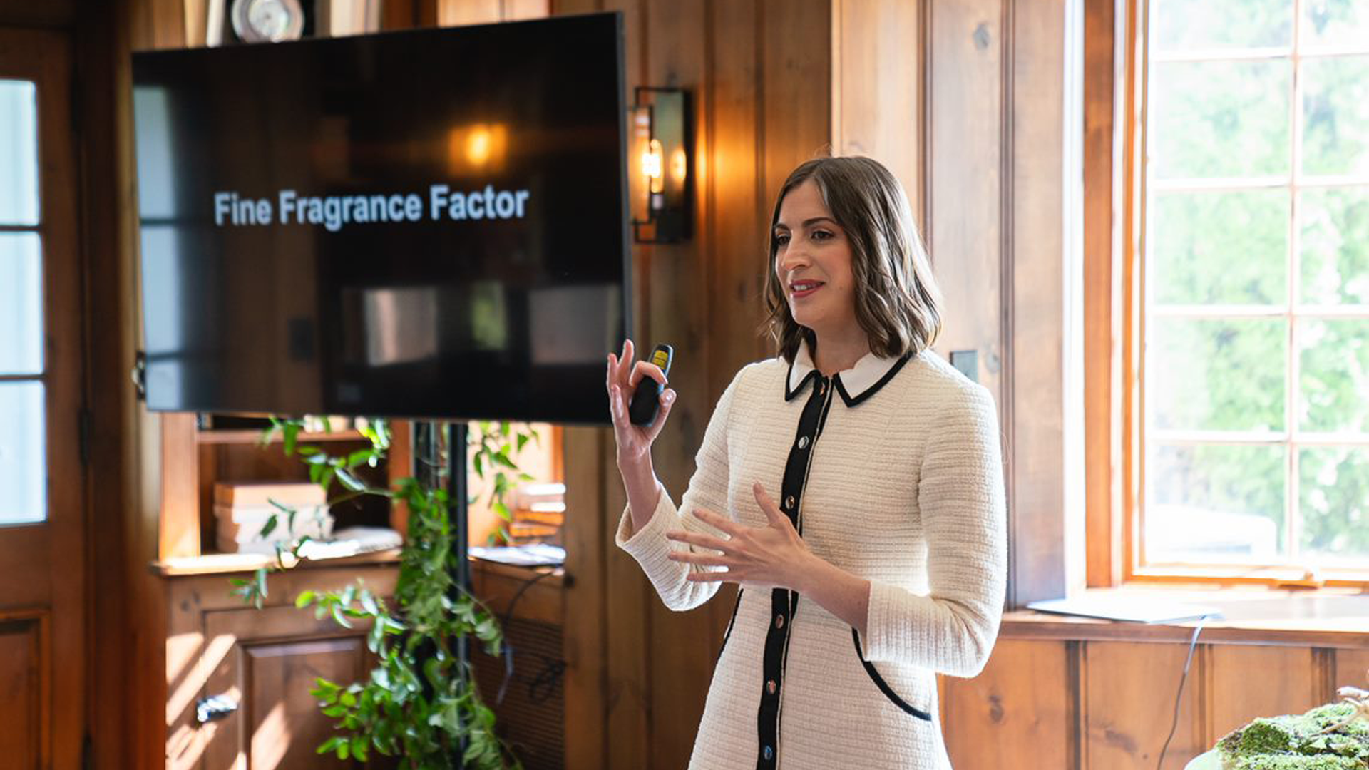 Noemie Lottiau, Fragrance Design Leader globally for Axe deodorants and skin cleansing products, in a black and white dress.
