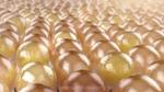 A close-up of the spheres that represent the lipids in our skin’s microbiome.