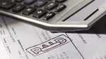 Calculator and paid invoice