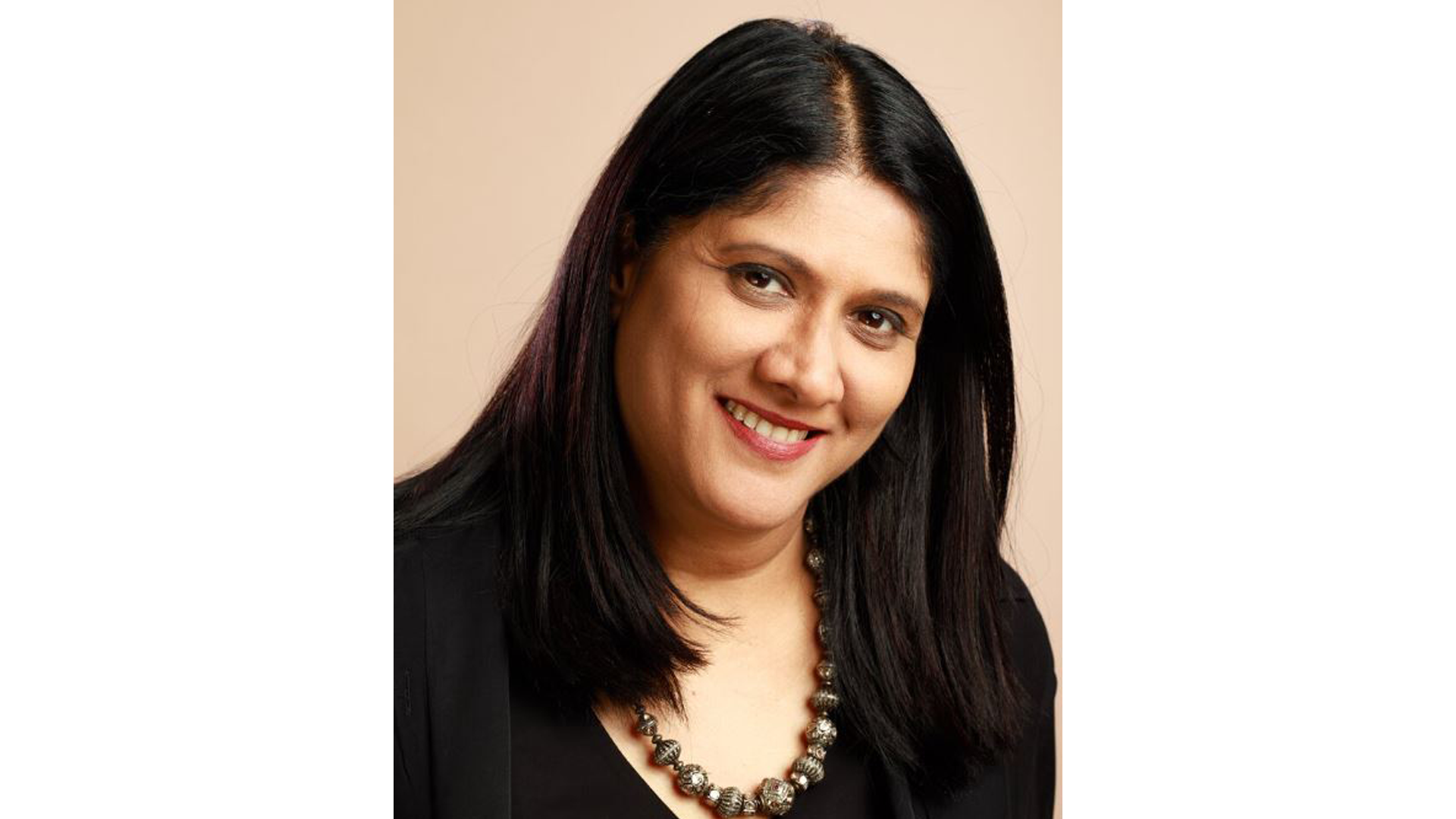 Headshot of Priya Nair, Global CMO, Beauty & Wellness 