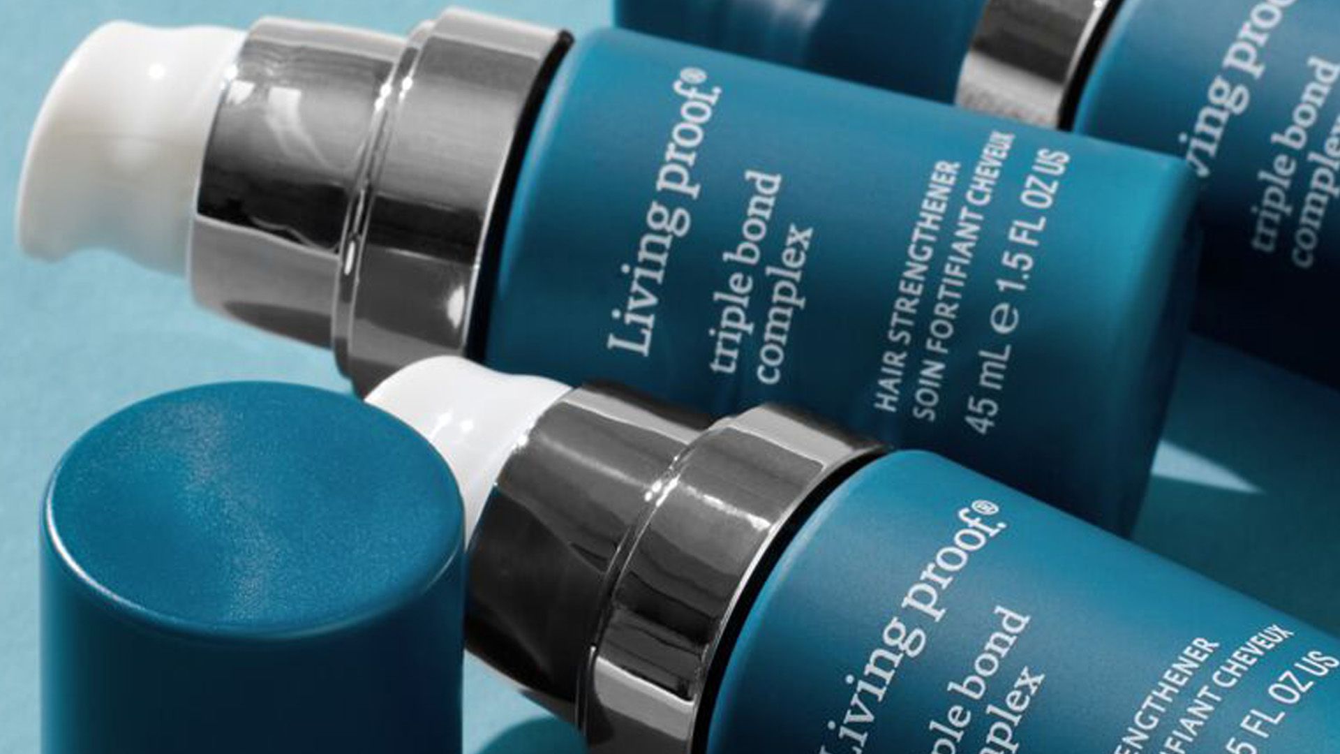 Close up of Living Proof’s Triple Bond Complex Hair Strengthener product.