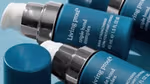 Close up of Living Proof’s Triple Bond Complex Hair Strengthener product.
