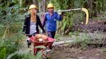 Two palm oil farmers