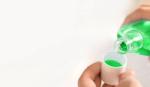 A photo of mouthwash in a glass