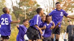 Children celebrating playing sports