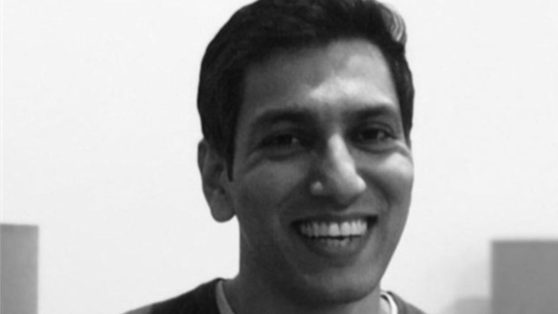 A black and white photo of Gaurav Datta, Global Vice President of Unilever Oral Care