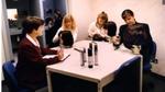 A group of women testing hair products