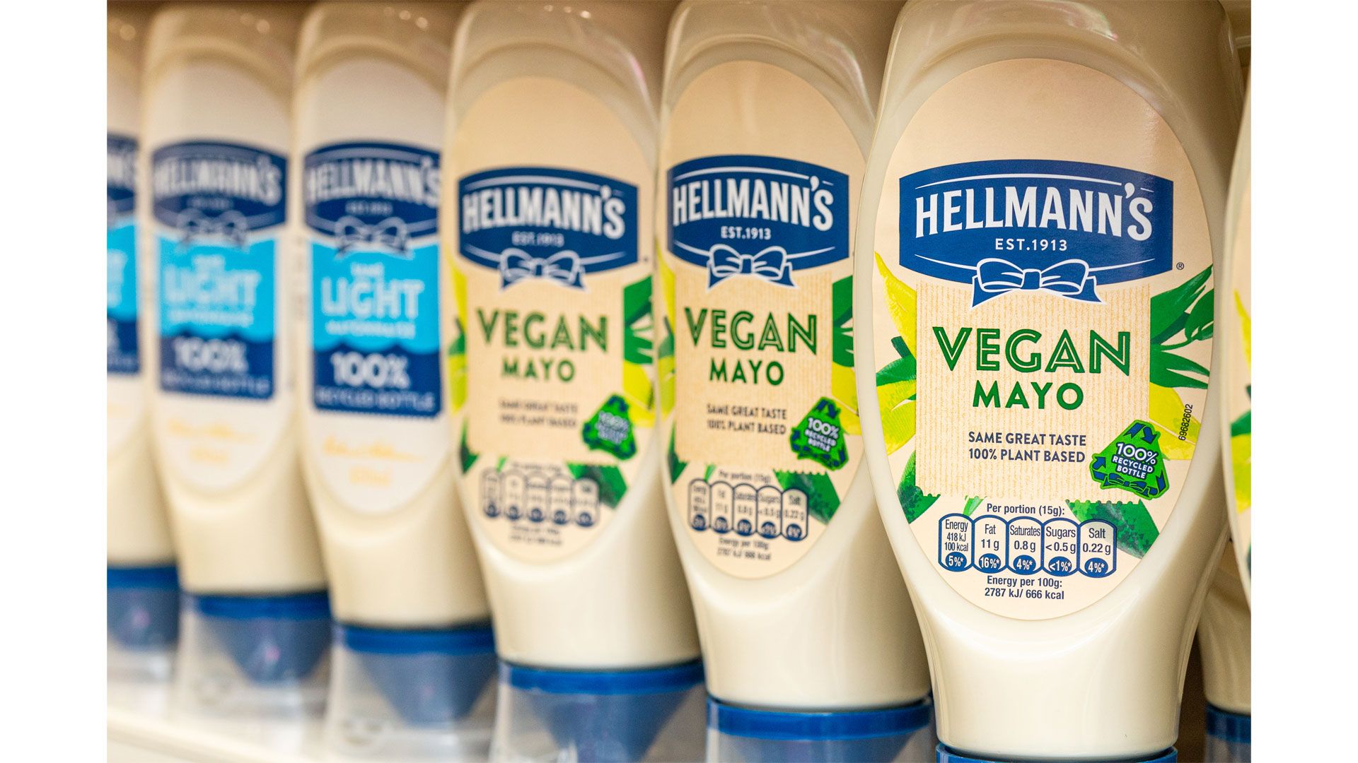 A selection of Hellmann’s products on a supermarket shelf.