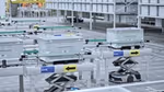 A production line in one of Unilever’s WEF Global Lighthouse Network factories, where robots help move goods efficiently.