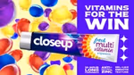 A tube of Closeup Fresh Multi Vitamin toothpaste surrounded by colourful capsules. The text reads: “vitamins for the win”, highlighting benefits like 18-hour freshness, antibacterial zinc and gel-like texture.