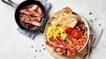 Image of scrambled eggs with The Vegetarian Butcher NoBacon, beans and tomatoes, toast and mushrooms