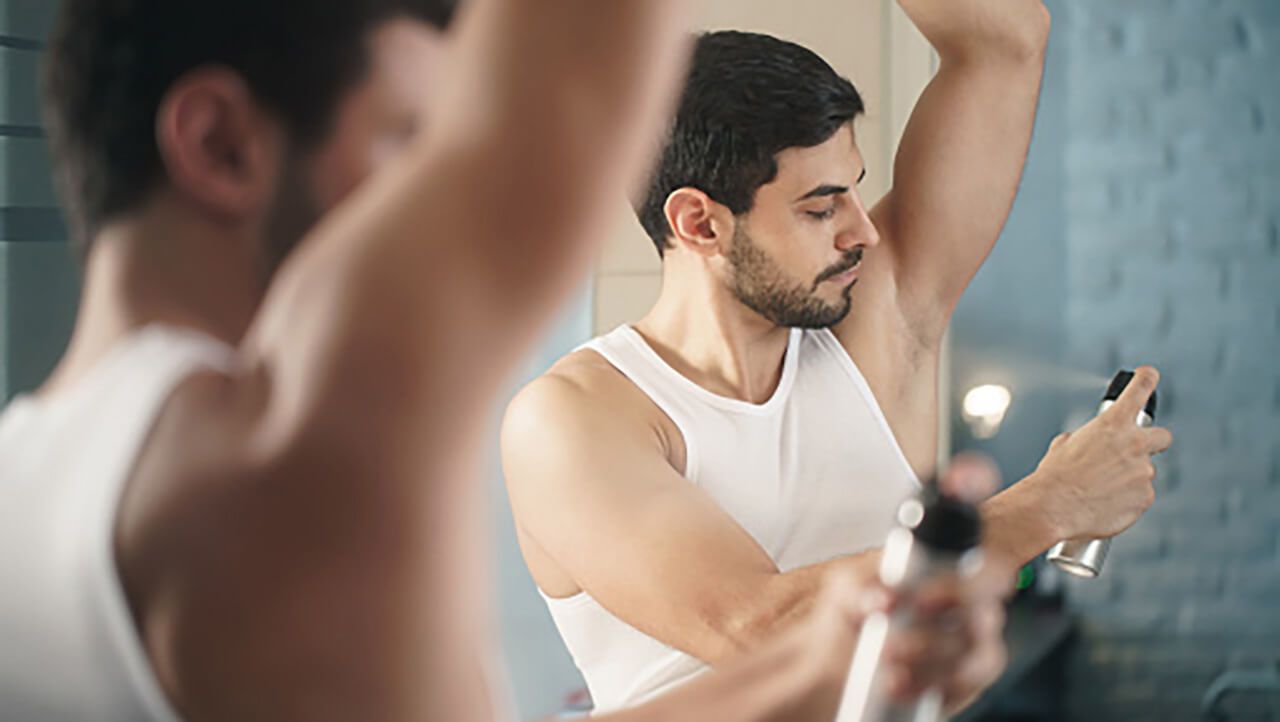 A person using a deodorant