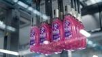 Bottles of Persil Wonder Wash on a factory production line.