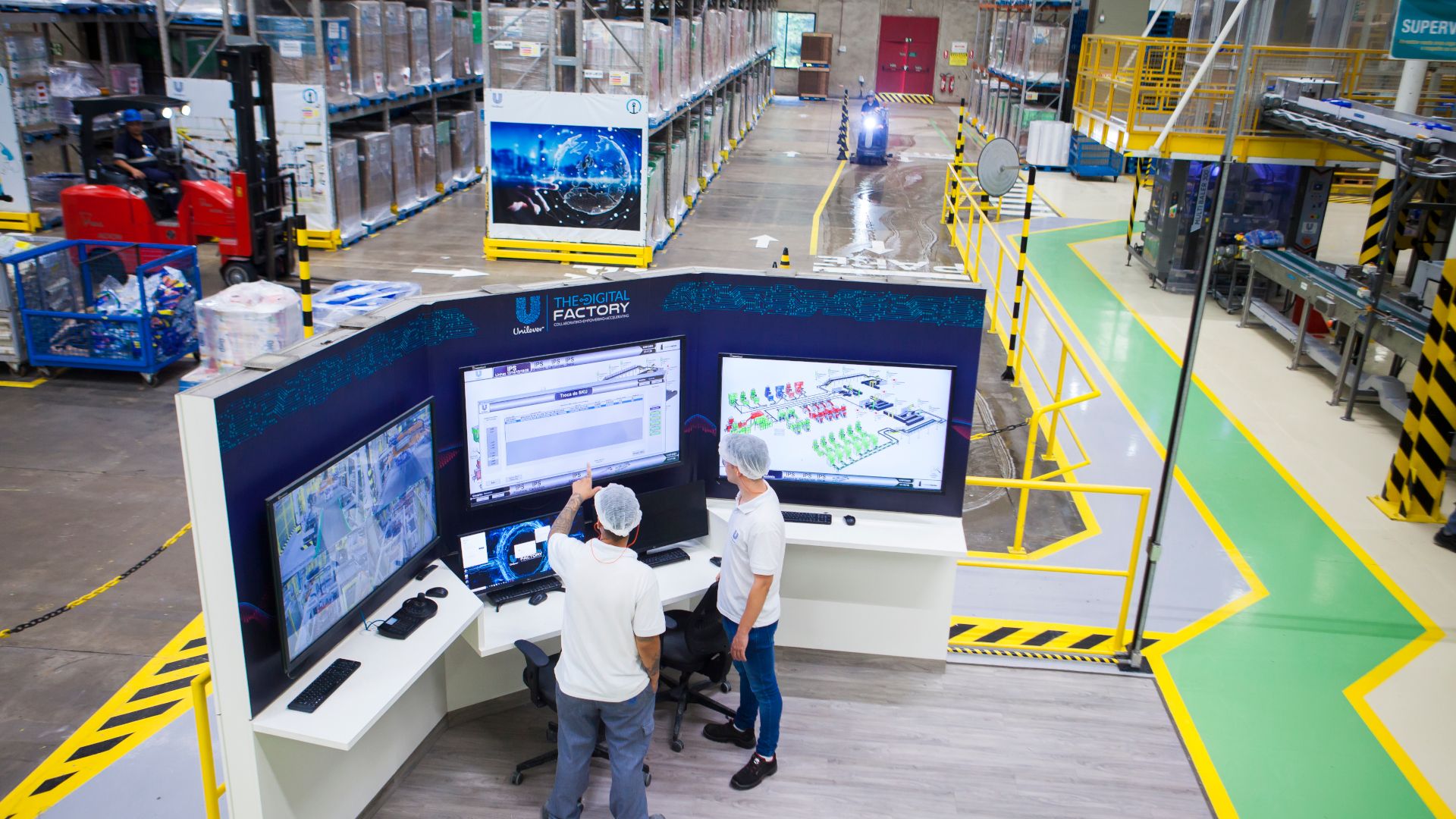 Workers at the Unilever factory, Brazil, use technology to improve efficiency.