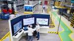 Workers at the Unilever factory, Brazil, use technology to improve efficiency.
