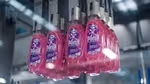 Bottles of Persil Wonder Wash on a Unilever factory production line.