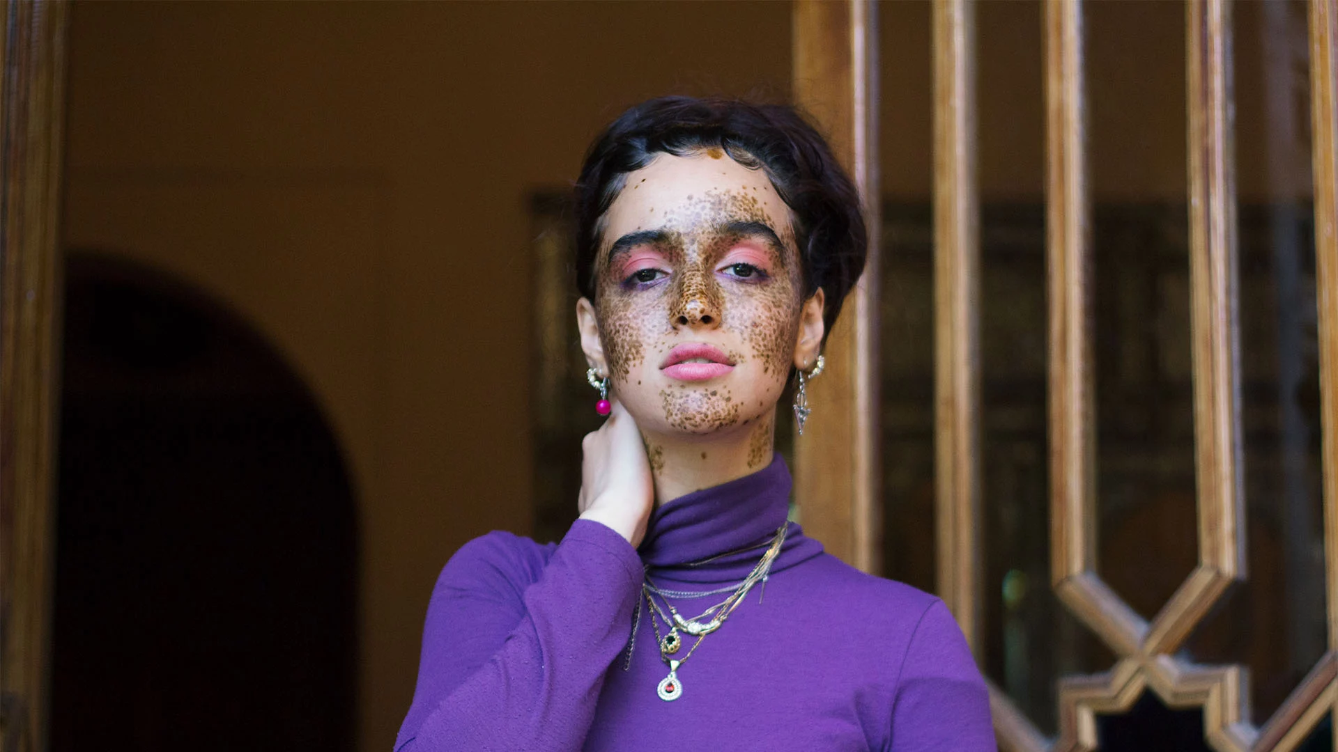 lady wearing a purple jumper