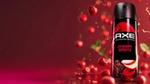 One of the latest fine fragrance variants, Cherry Spritz. A black deodorant can is in front of a red background of cherries.