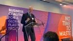 Alan Jope speaking from a podium on financials at the 77th United Nations General Assembly during Climate Week in New York