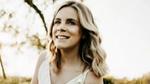 A photo of Em Heath, Global Engagement Director for Rexona. Em is a white woman with blonde hair, smiling at the camera.