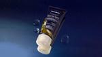 A tube of Vaseline Gluta- Hya Overnight Radiance Repair lotion with a backdrop of a starry night sky.