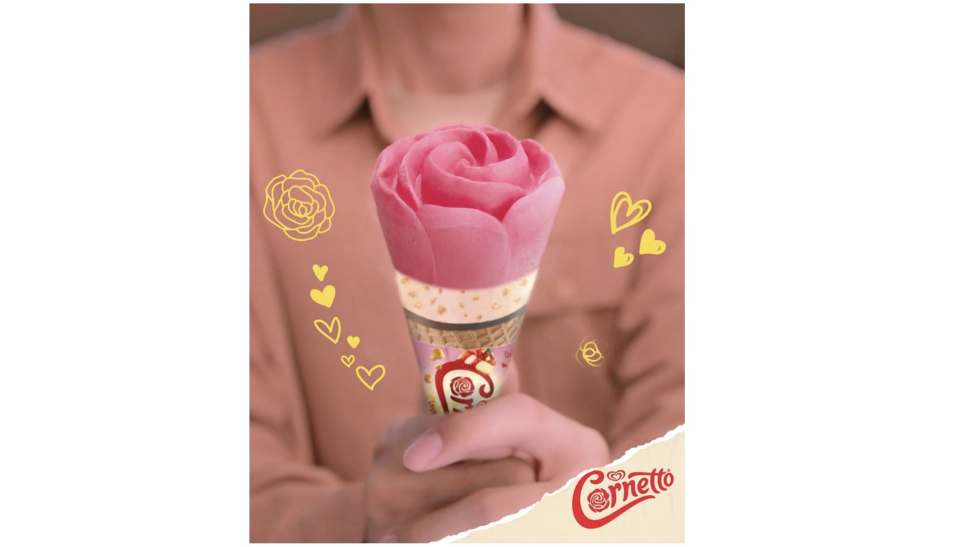 Woman holding the distinctive pink rose-shaped Cornetto Rose cone
