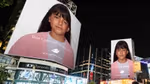 Image of a girl on billboards that state ‘Don’t just call me beautiful’ on one and ‘Call me strong’ on the other.