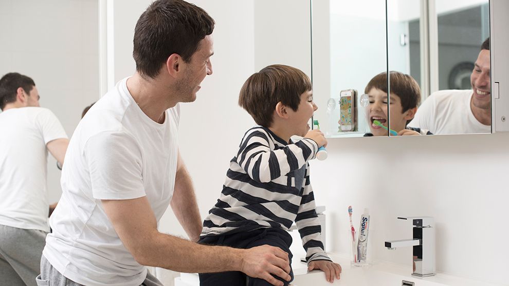 Boy brushing teeth