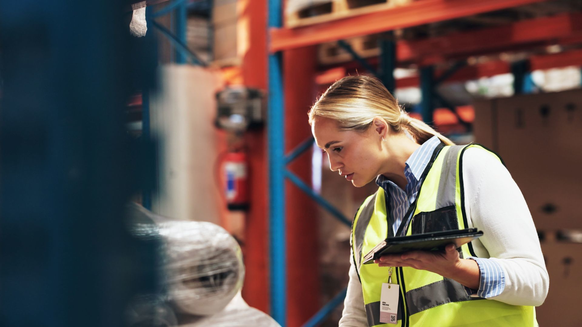 Lady in warehouse.