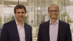 Fernando Fernandez, Unilever’s Chief Executive Officer, standing on the left and Srinivas Phatak, Unilever’s acting Chief Financial Officer, standing on the right. Both are wearing dark suits with light coloured shirts.