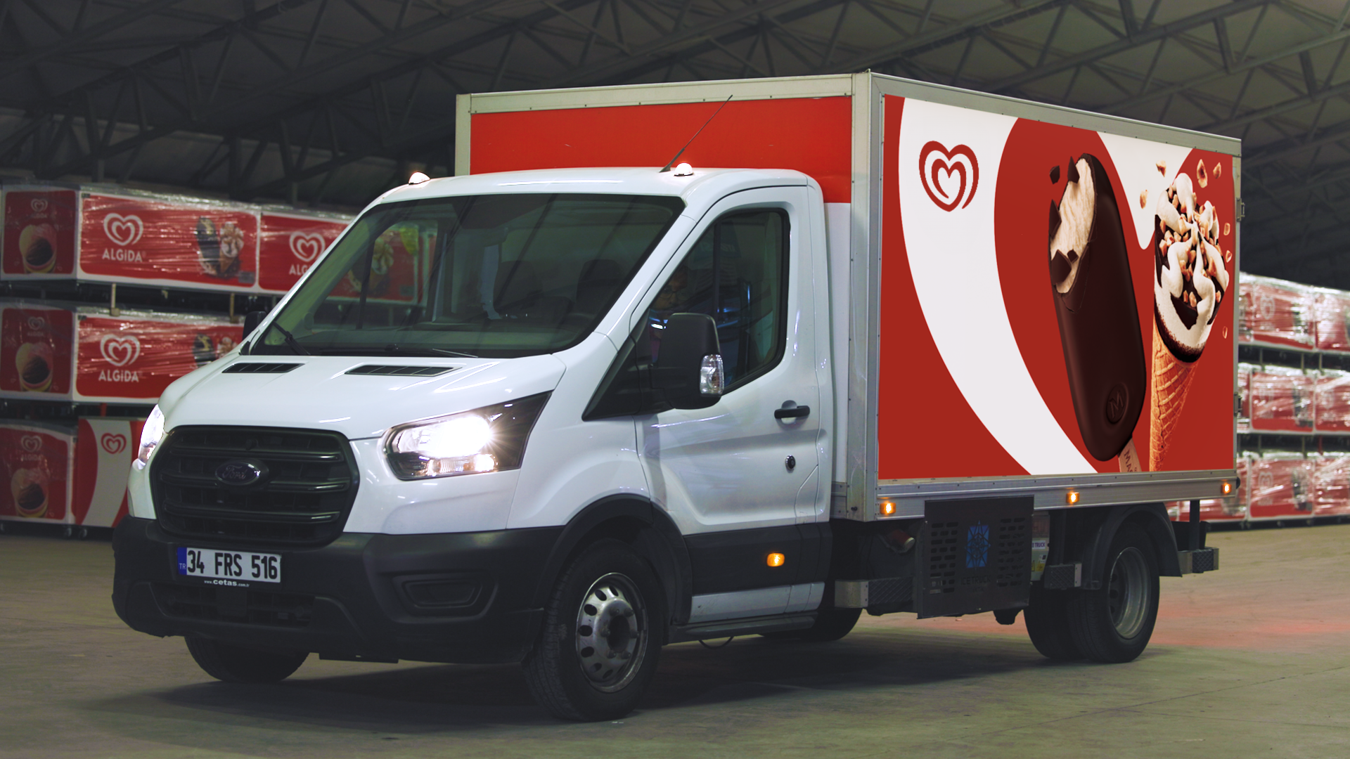 A Wall’s branded truck restocking products inside a warehouse.