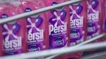 Multiple pink bottles of Wonder Wash lined up.