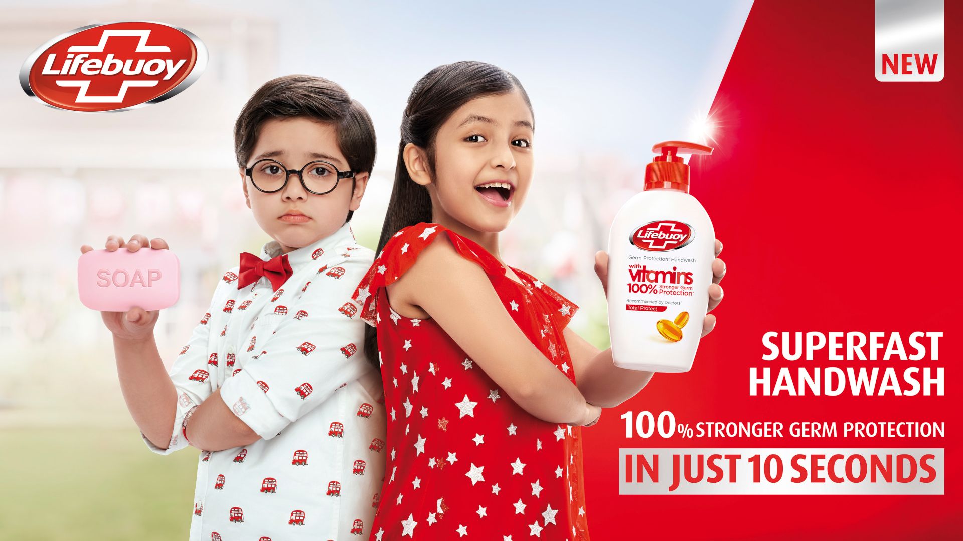 Two children hold Lifebuoy soap products and face the camera. Lifebuoy is one of Unilever’s most popular brands in Pakistan.