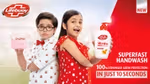 Two children hold Lifebuoy soap products and face the camera. Lifebuoy is one of Unilever’s most popular brands in Pakistan.