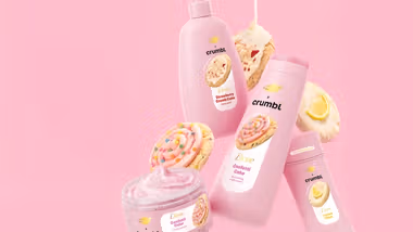 Promotional banner for a limited-edition Dove x Crumbl collaboration. The image features a pink background with cookie visuals and Dove-branded personal care products.