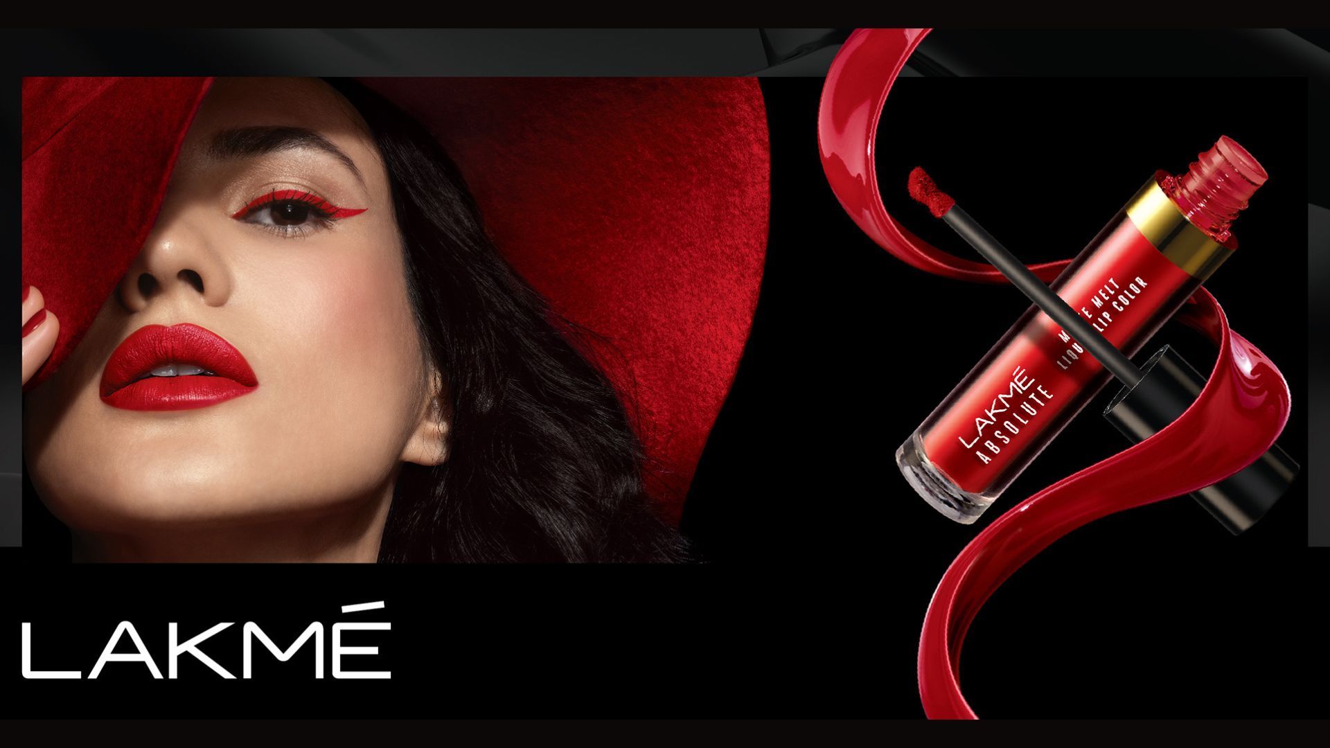 A model with long dark hair and a red hat wears Lakmé Absolute liquid lip colour in a bold red, with red winged eyeliner.