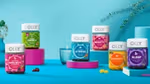 Six jars of various OLLY products. Olly makes vitamins and supplements that deliver what it terms ‘real deal’ benefits.