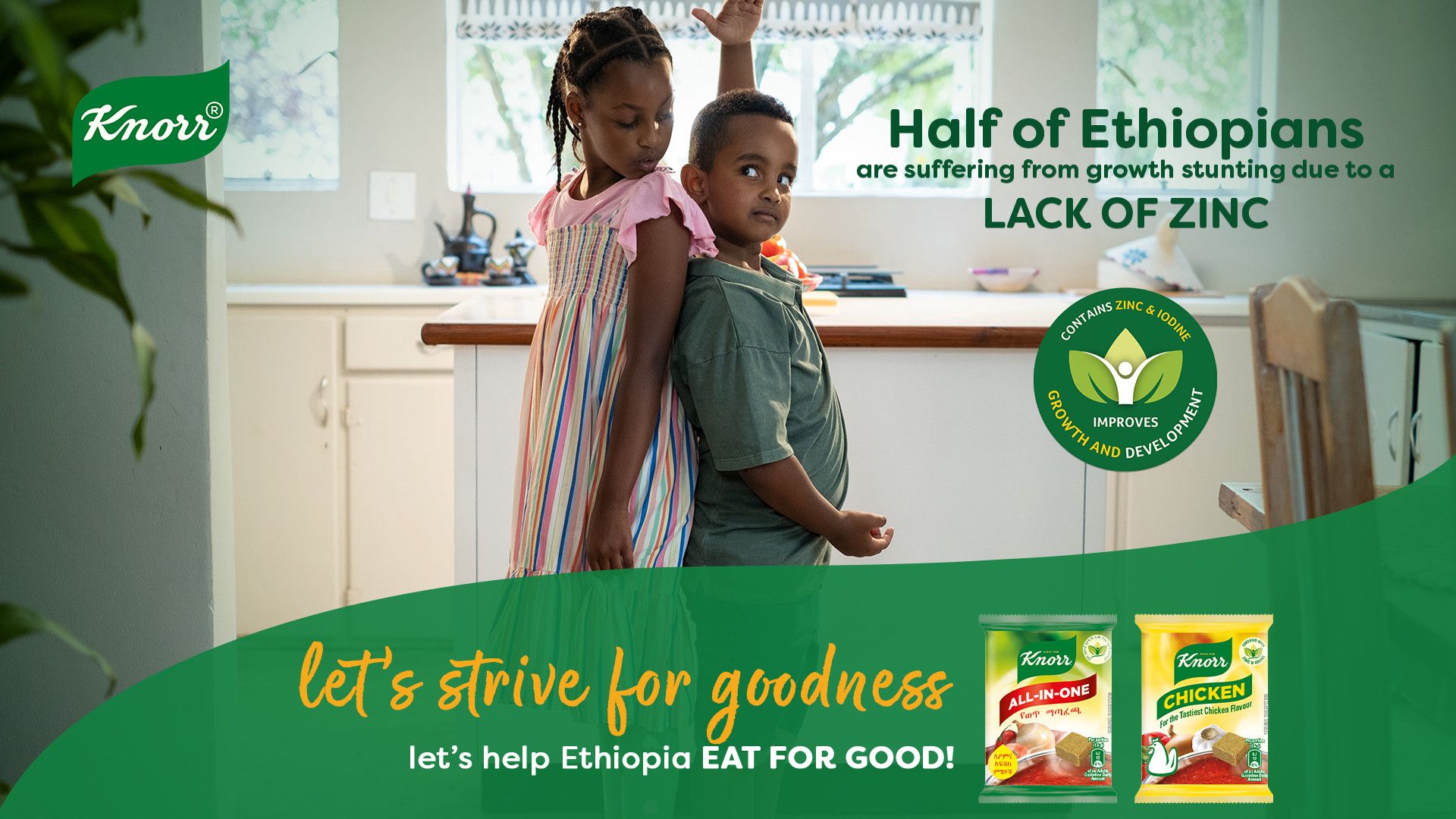 Boy and girl comparing their heights in advert for Knorr with zinc 