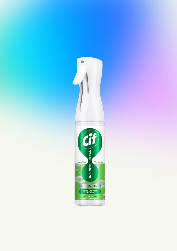 A bottle of Cif All-in-One Infinite Clean spray with a white trigger top, set against a blue‑to‑purple gradient background.