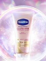 Tube of Vaseline Healthy Bright Gluta-Hya Serum Burst Lotion Dewy Radiance displayed inside a glowing, iridescent bubble with a soft pink and purple background.